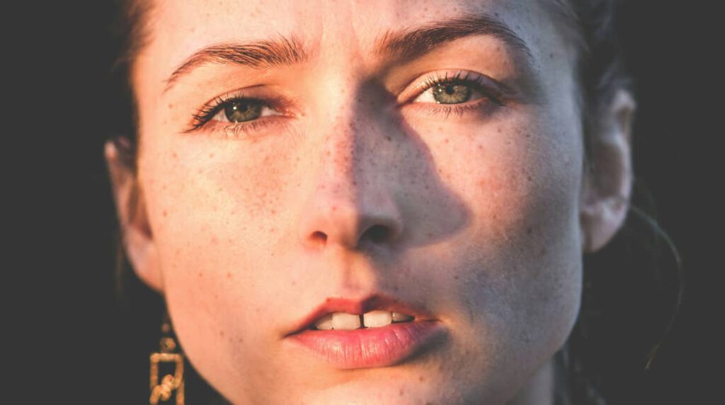 a woman with a gap between her teeth